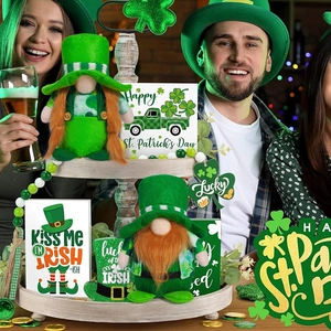 Detail of St. Patrick's Day plush gnomes with green shamrock decor and holiday signs