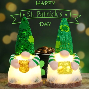 Close-up of LED glowing St. Patrick's Day gnomes with sequins and clover hats