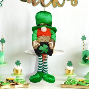 Macro detail of St. Patrick's Day gnome featuring striped legs and green sequin clovers