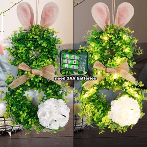Détails de la couronne lapin de Pâques montrant les LED et le boîtier à piles 3AA