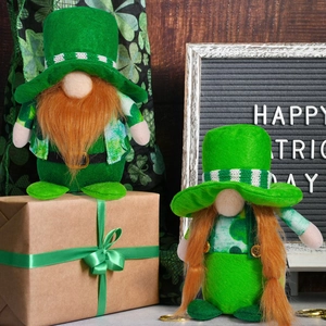 Detail of St. Patrick's Day gnomes with green hats and orange beards on a festive background