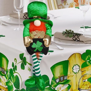 Detail of St. Patrick's Day gnome featuring long striped legs and a gold coin bag