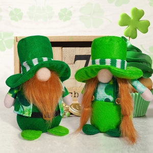 Macro detail of St. Patrick's Day gnomes with green shamrock hats and orange beards