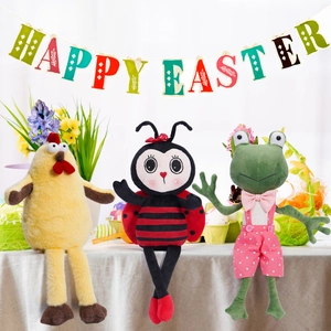 Easter plush frog, chick and ladybug decorations with Happy Easter banner setup