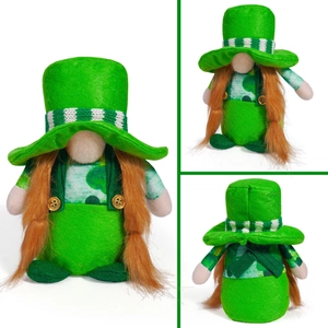 Detail view of St. Patrick's Day green gnome plush with orange braids and clover patterns