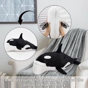 Instructional view showing how to fluff the whale plush pillow after vacuum compression