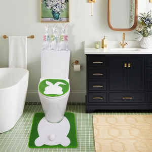 Close-up of green Easter toilet cover and U-shaped rug set with white bunny design