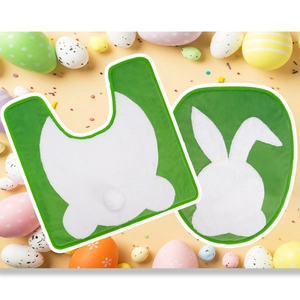 Detail of Easter bunny silhouette and plush tail on green velvet bathroom mat set