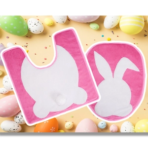 Detail of Easter bunny bath mat set in vibrant pink flannel with 3D fluffy white tail