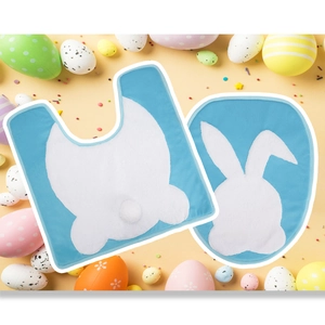 Detail of blue Easter toilet cover and U-shaped mat with fuzzy bunny silhouette design