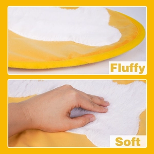 Detail showing the fluffy and soft white plush texture of the yellow Easter toilet cover