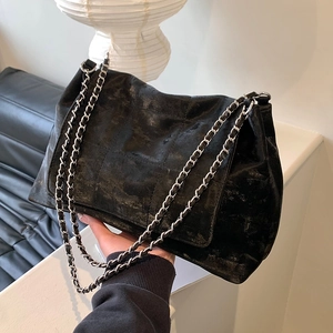 Matte vintage black tote bag with quilted pattern and silver chain strap for women