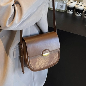 Sacoche selle vintage en cuir marron pour femme avec design patchwork rétro et bandoulière