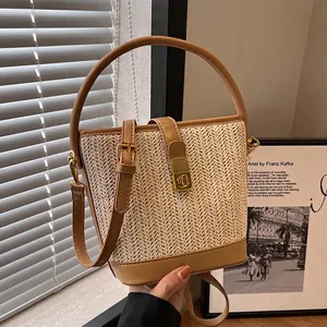 Women Retro Straw Woven Bucket Bag Luxury PU Leather Splicing Handbag Versatile Summer Crossbody Bag With Gold Metal Lock