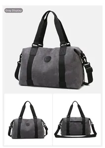 Detail view of grey canvas travel bag with adjustable strap and back zipper pocket