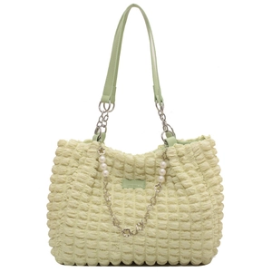 Pale green bubble textured tote bag with elegant pearl flower chain and leather handles