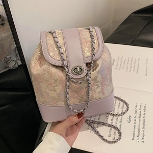Chic lavender jacquard bucket backpack with silver chain strap and floral pattern