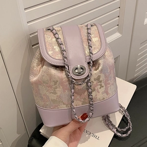 Elegant purple quilted mini chain backpack with jacquard fabric and silver lock buckle