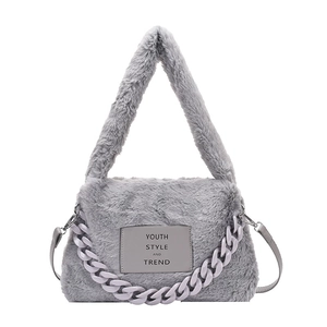 Furry grey winter tote bag with purple plastic chain and plush long hair texture