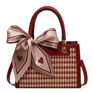 Retro houndstooth crossbody bag with red woven handle and elegant heart print scarf