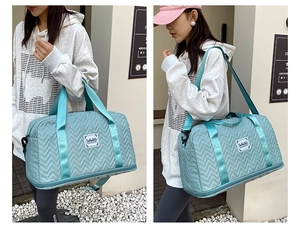 Detail of mint green quilted travel bag showing waterproof fabric and shoe compartment