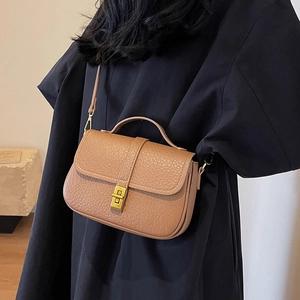 Brown litchi grain leather small square bag with top handle and gold metal twist lock