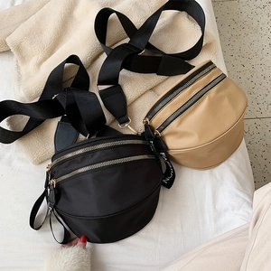 Minimalist nylon crescent crossbody bags in black and khaki with adjustable fashion straps