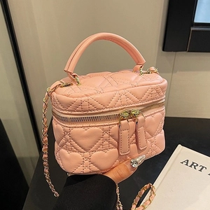 Pink heart quilted chain box bag with dual zippers and elegant metallic gold hardware