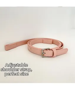 Detail of adjustable light pink PU leather shoulder strap with silver square buckle