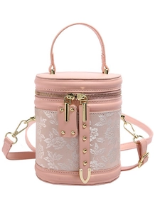 Pink bucket bag with floral embroidery, dual metal zippers, and adjustable shoulder strap