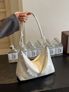 Minimalist beige underarm bag with silver chain and marble bead strap decoration
