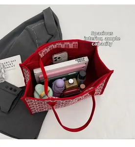 Macro shot of spacious red wedding tote interior with large capacity for daily essentials