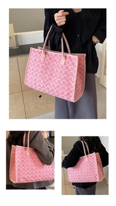Detailed view of pink wedding tote bag with traditional Double Happiness patterns