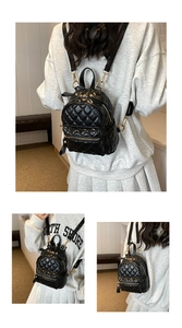 Macro view of black quilted mini backpack with gold zippers and polished PU leather texture