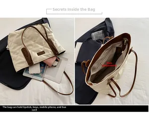 Detailed view of spacious quilted tote interior with main zipper pocket and lining