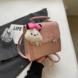 Pink PU leather mini backpack with pearl trim, star buckles, and plush charm detail