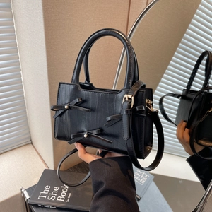 Sweet black faux leather tote bag with pearl bows and crocodile texture