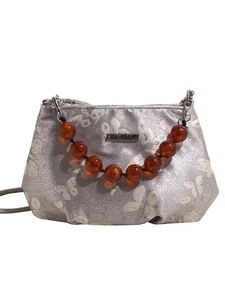 Silver beaded handbag with white butterfly prints and amber resin handle for women