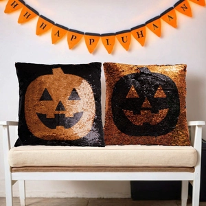 Cojines de lentejuelas reversibles con calabaza de Halloween en negro y dorado