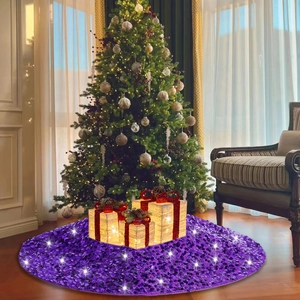 Elegant purple sequin Christmas tree skirt with festive gift boxes and warm home decor