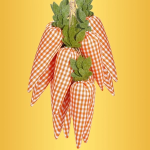 Detail of Easter orange plaid fabric carrots hanging by a rustic jute rope