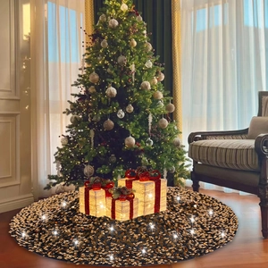 Sequin Christmas tree skirt with luxury glowing gift boxes and festive berry ribbon decor