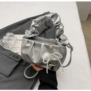 Silver metallic ruched PU handbag with pearl bow charm and adjustable long strap