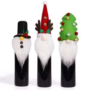 Three-piece Christmas wine bottle covers with gnome and snowman designs for festive decor