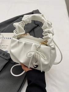 Minimalist white pleated cloud handbag with pearl bow and heart charm for women