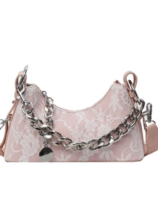 Chic pink crescent underarm bag with white floral lace overlay and silver chain