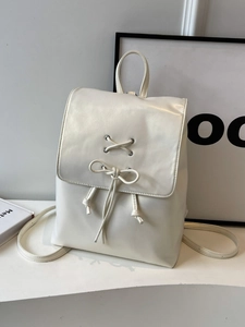 Sac à dos blanc ivoire style ballet avec nœud papillon et détails de laçage