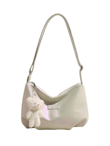 Minimalist pearl white tote bag with adjustable strap and cute plush bear keychain