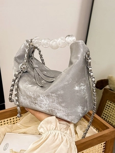 Silver bead handle handbag with metallic finish and transparent acrylic beads