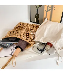 Hollow knit shoulder bag set with canvas inner pouch showing spacious storage capacity